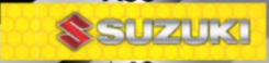 LLAVERO CON CINTA GRANDE SUZUKI COLOR AMARILLO CON PUNTOS